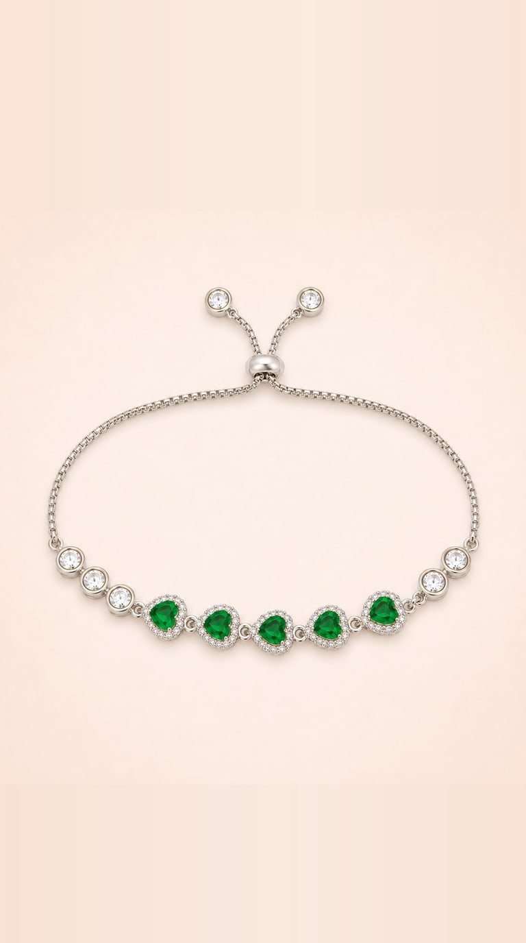 Sterling silver slider bracelet set with five heart-cut green stones in white halos